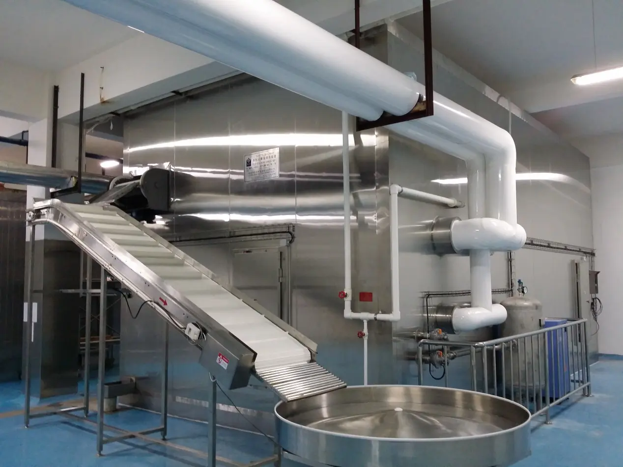 A Shiny Stainless Steel Machine With A Conveyor Belt, Ready To Take On Any Task